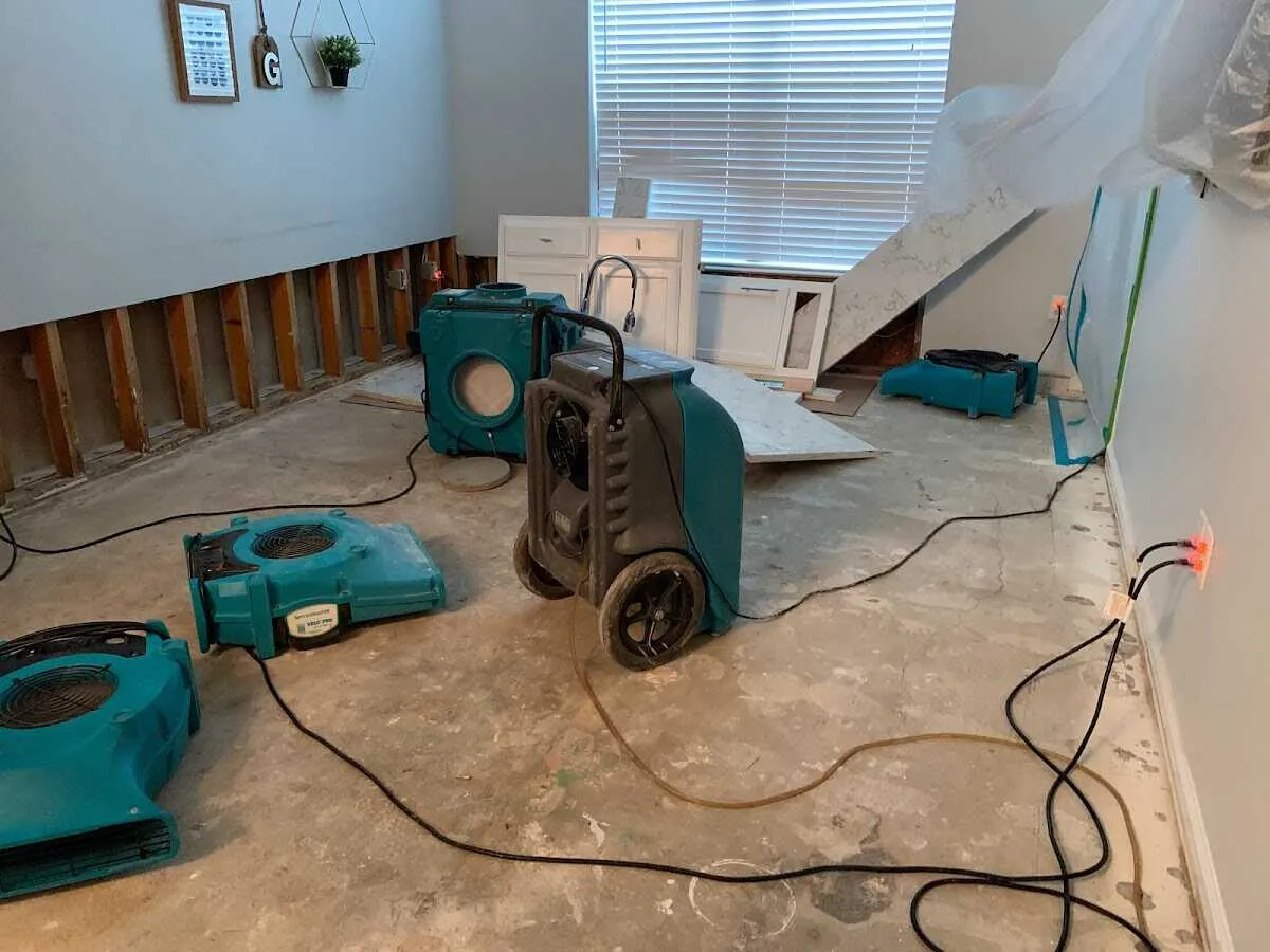 Dehumidifier in flood-cut room for Water Damage Restoration in Madison Heights
